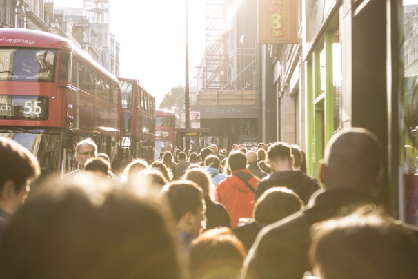 Crowded urban street symbolizing the need for an urban sanctuary and personal development